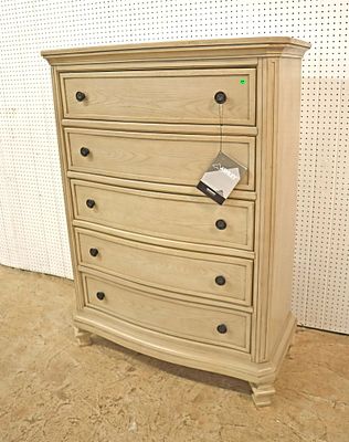 Like new Ashley 5 drawer high chest with tag, does have rub mark in back top approx. 42" w x