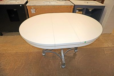Like new oval metal base 42" breakfast table. Like new oval top metal base 42" round breakfast