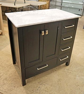 New 36" Marble top bathroom vanity. New 36" off center marble top bathroom vanity with easy