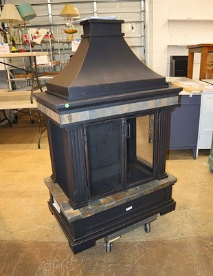 Like new never used outdoor fireplace. Like new, never used, outdoor fire place with poker