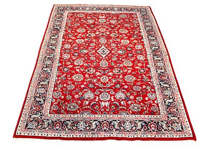 Hand stitched 70" x 110" rug, good condition with noticeable odors, stains, rips or tears, in 