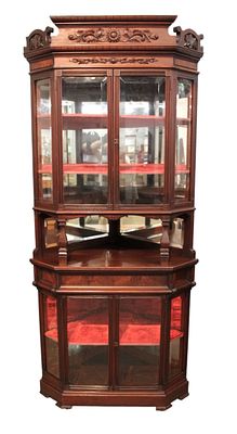 Antique beveled glass carved mahog corner cabinet. Nice antique beveled glass 4 door carved 