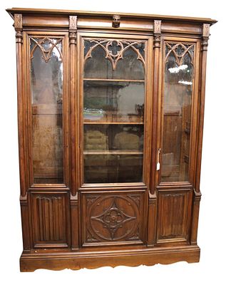 Antique gothic walnut bookcase w/wavy glass & key. Impressive antique gothic style 3 door solid 