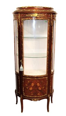 Vintage FR inlaid bow front crystal cabinet w/bronze, key. Vintage french style inlaid bow front 