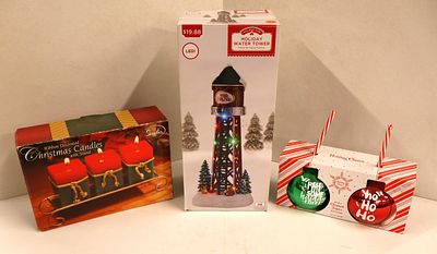 3 piece lot: 2 boxes of holiday candles and an LED holiday water tower in boxes.