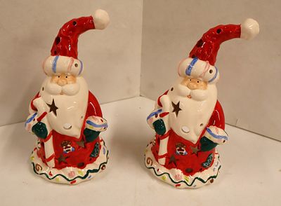 2 porcelain Santa candle holders. Approx. 9.5"h x 5" diameter