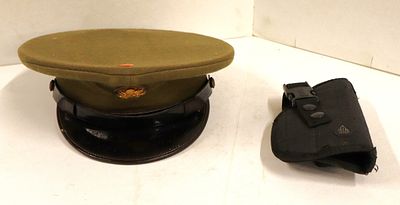 Vintage military hat and pistol holster. 2 piece lot: vintage military hat and pistol holster.