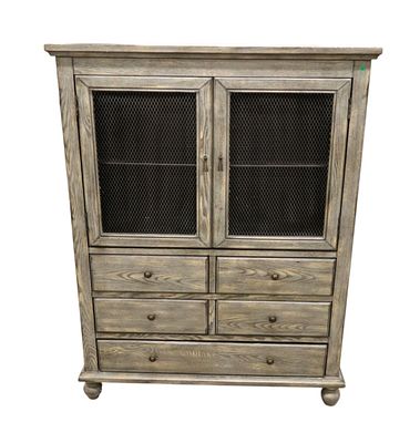 Coast to Coast decorator cabinet with wire front doors in gray wash oak finish. Coast to Coast 