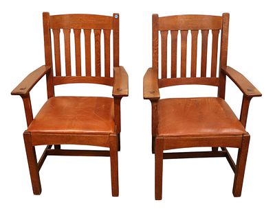 Pair Stickley mission oak arm chairs with leather seats. Pair of Stickley mission oak arm chairs 