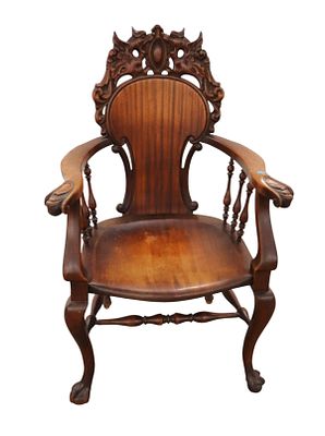 Antique wing griffin carved mahogany b/c wing chair. Antique wing griffin carved solid mahogany 