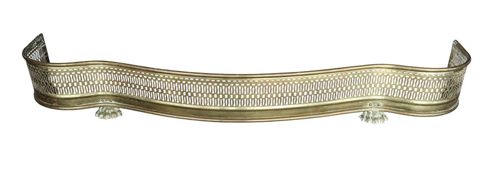 Antique brass paw foot fireplace fender, structurally sound, does show patina. 6.5"h x 49"w x 9.5"d