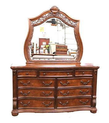 Contemporary serpentine low chest. Contemporary carved burled walnut 9 drawer serpentine low 