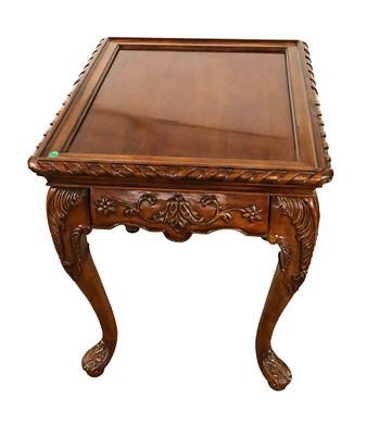 Quality Hekman carved veneer top end table. Quality Hekman carved burled solid mahogany with 