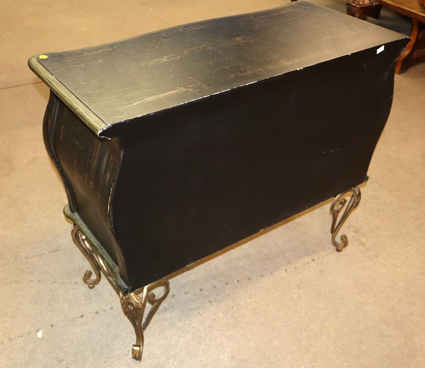 Parrot paint decorated chest on scroll metal legs