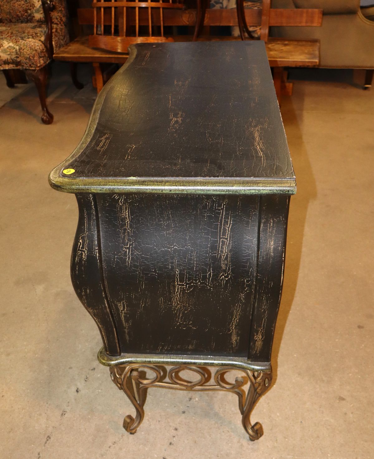 Parrot paint decorated chest on scroll metal legs
