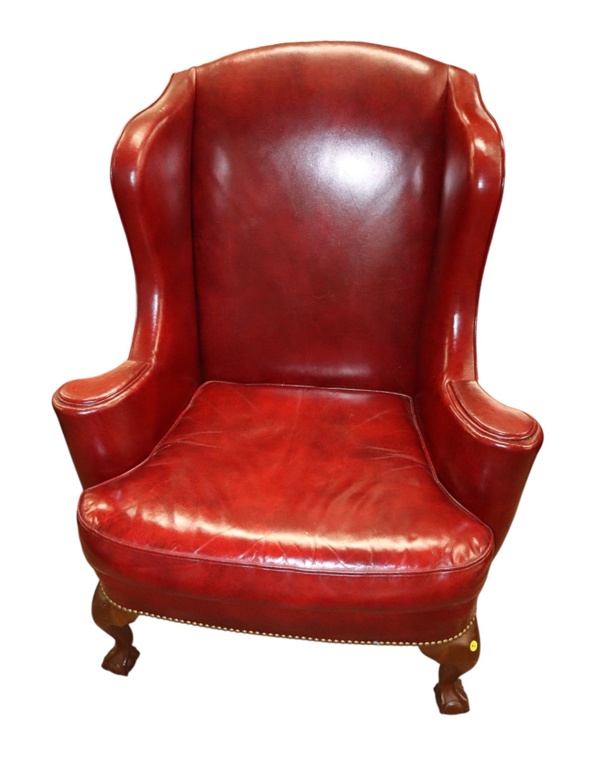 Quality burgundy leather ball & claw wing chair