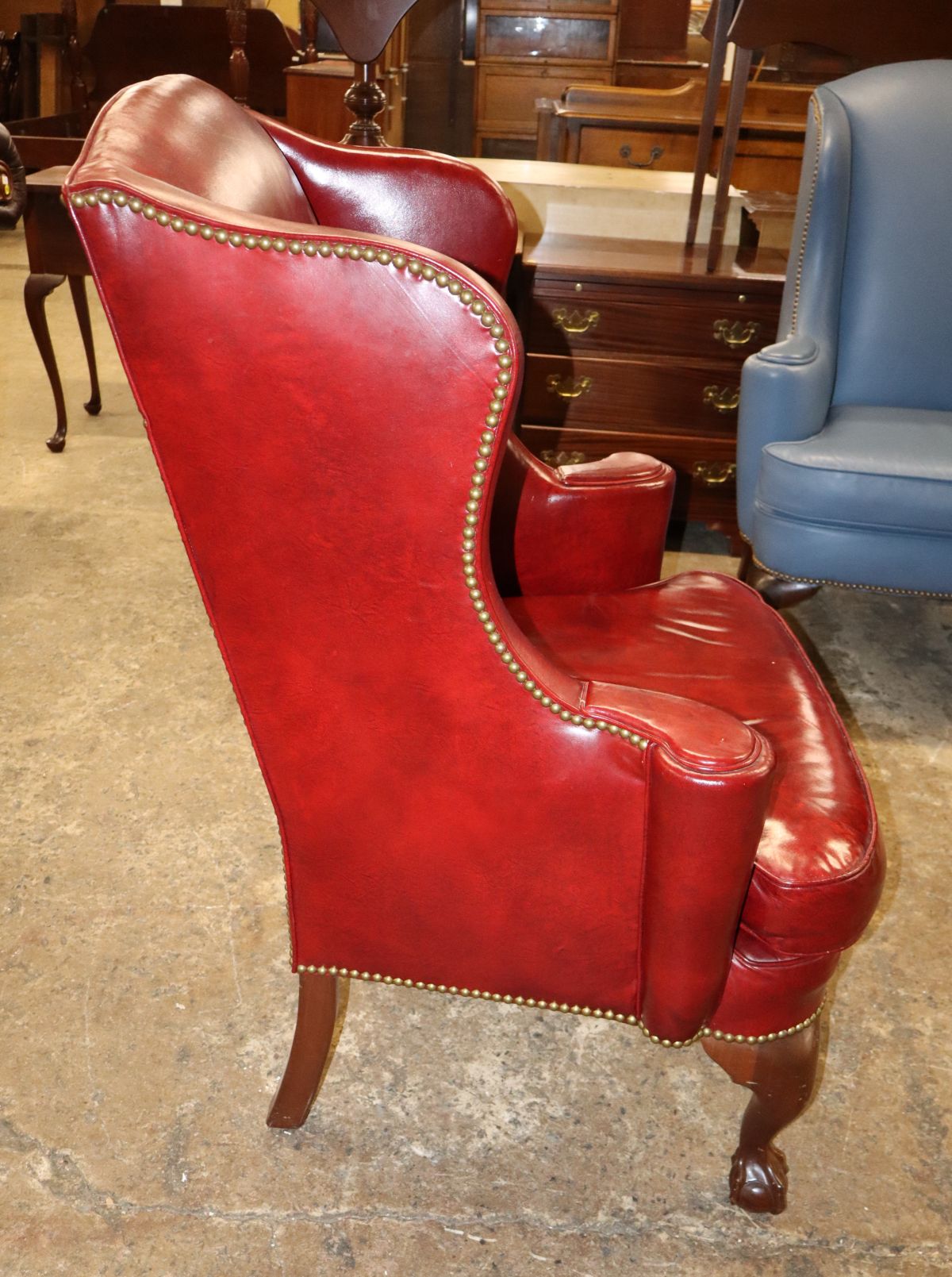Quality burgundy leather ball & claw wing chair