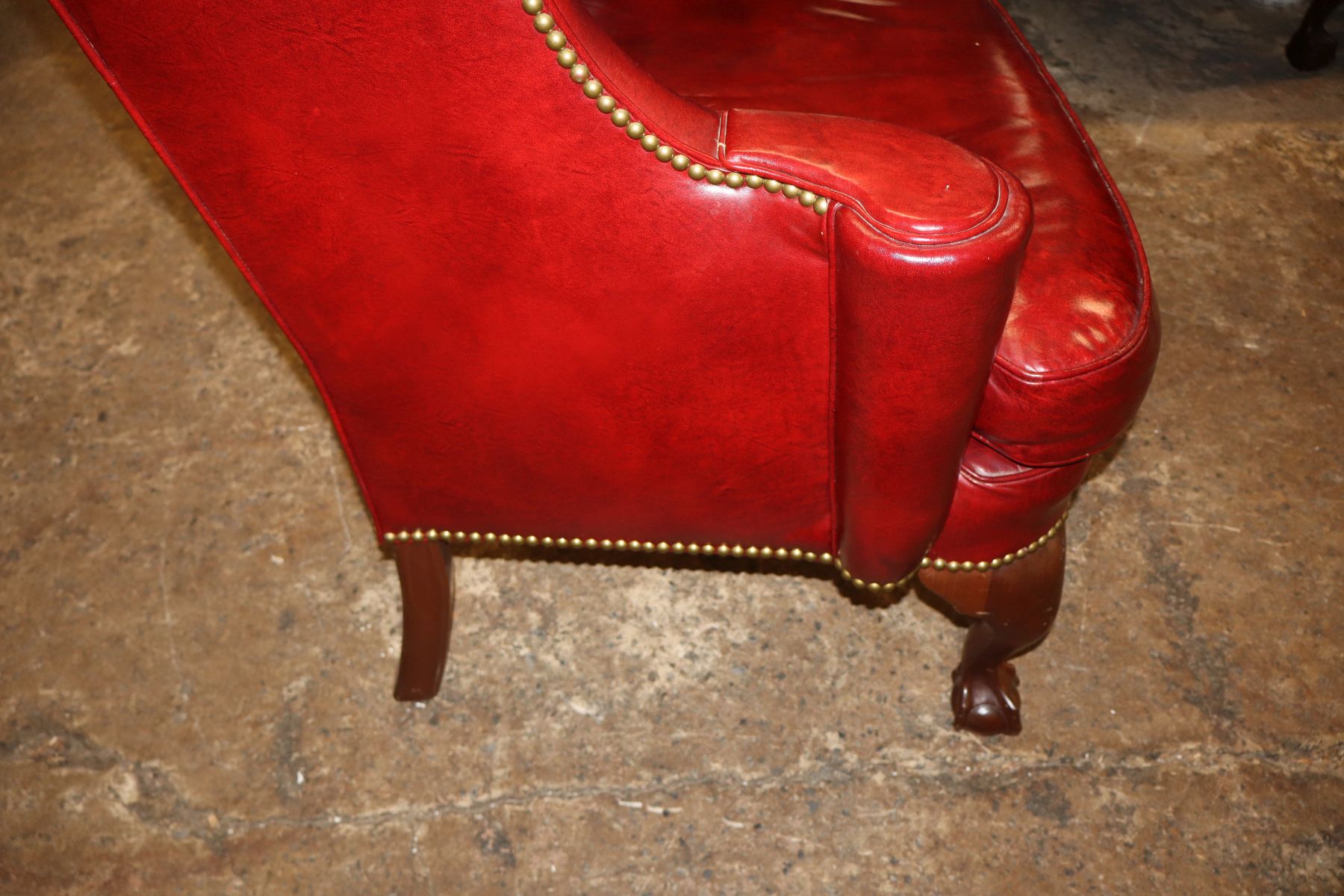 Quality burgundy leather ball & claw wing chair