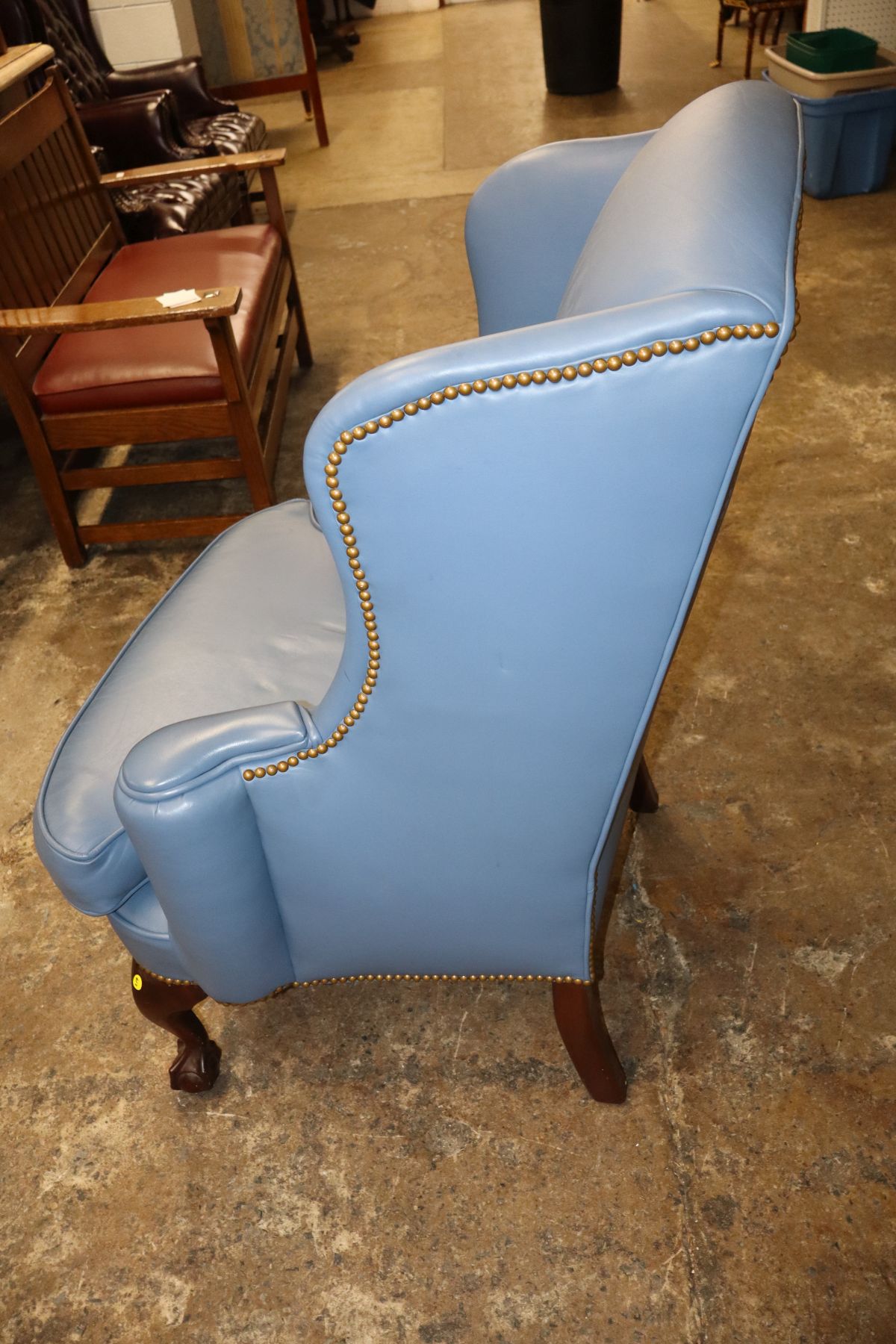 Quality blue leather ball & claw wing chair