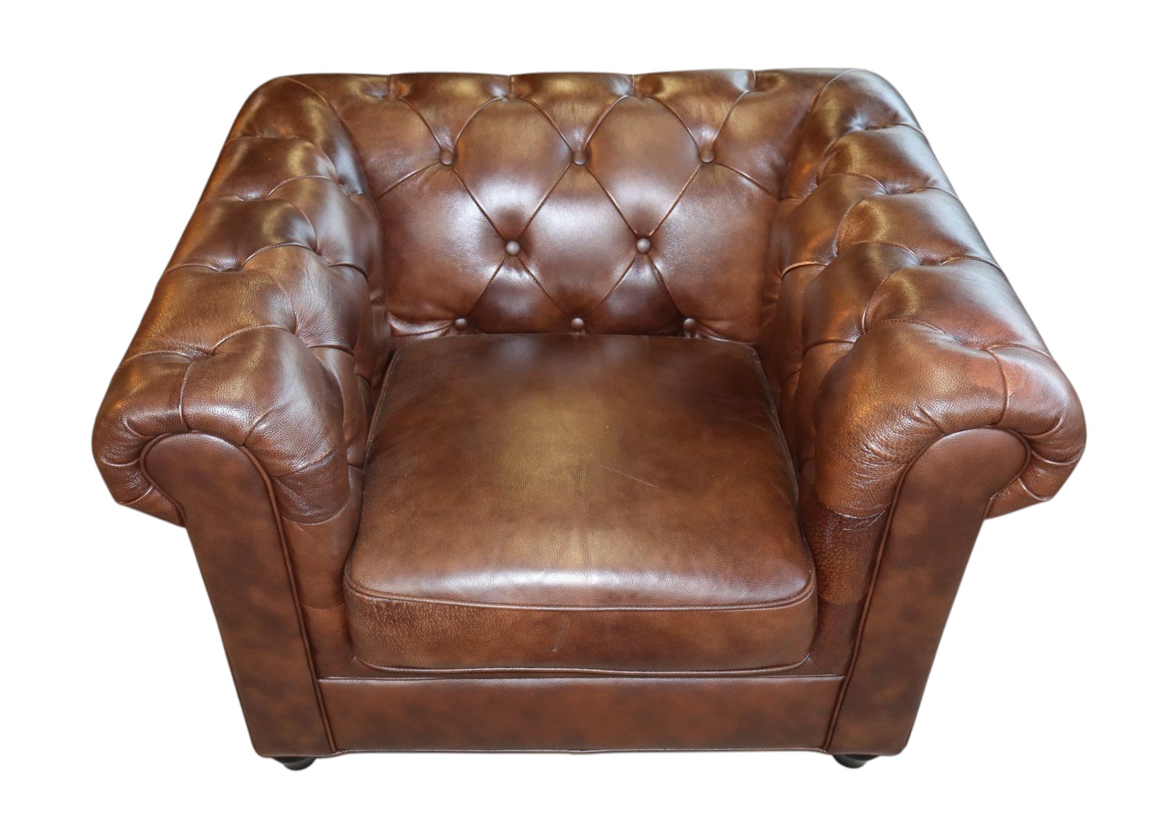 Brown leather even arm button tuft club chair