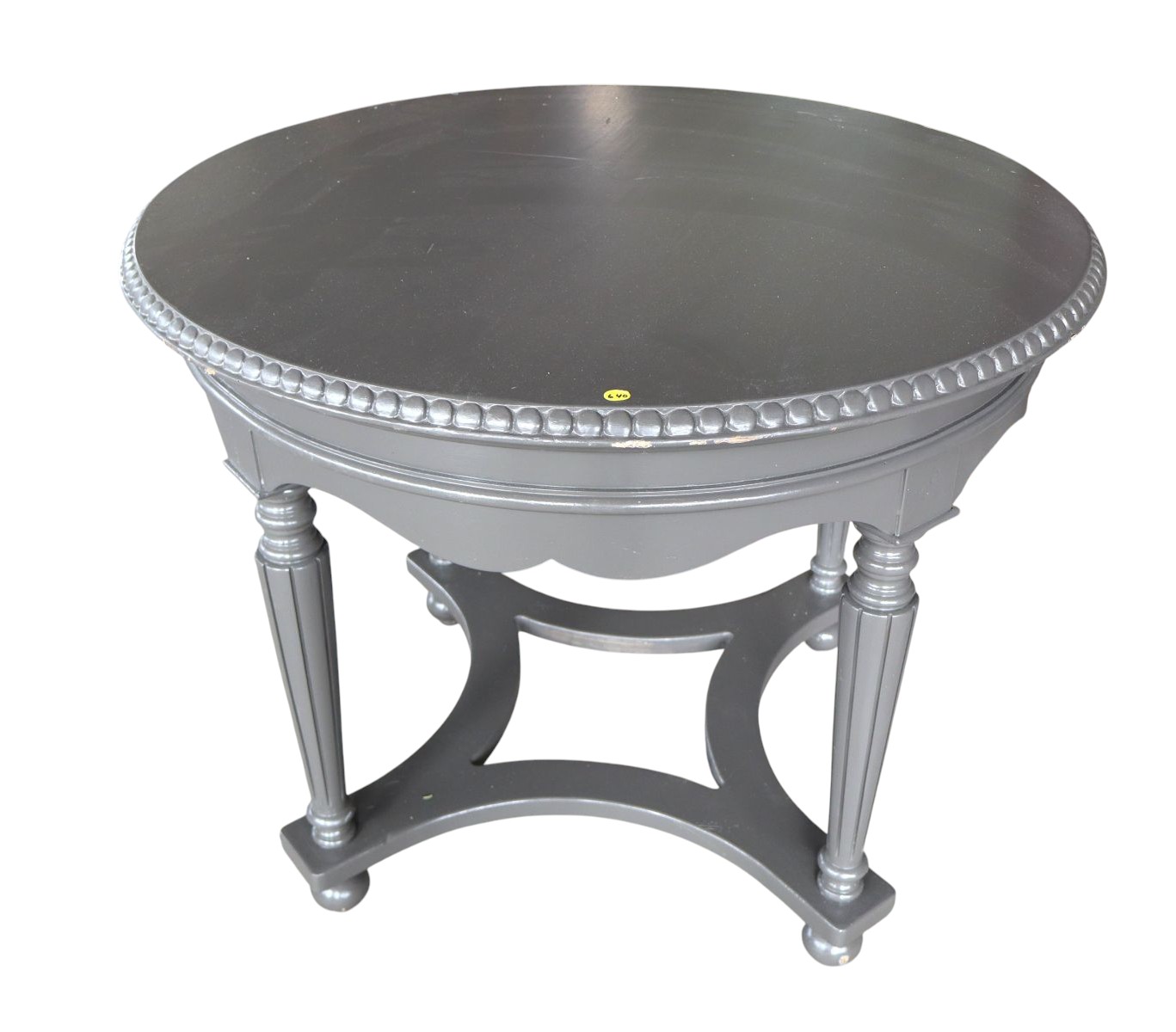 Carved 38" round center table in grey paint