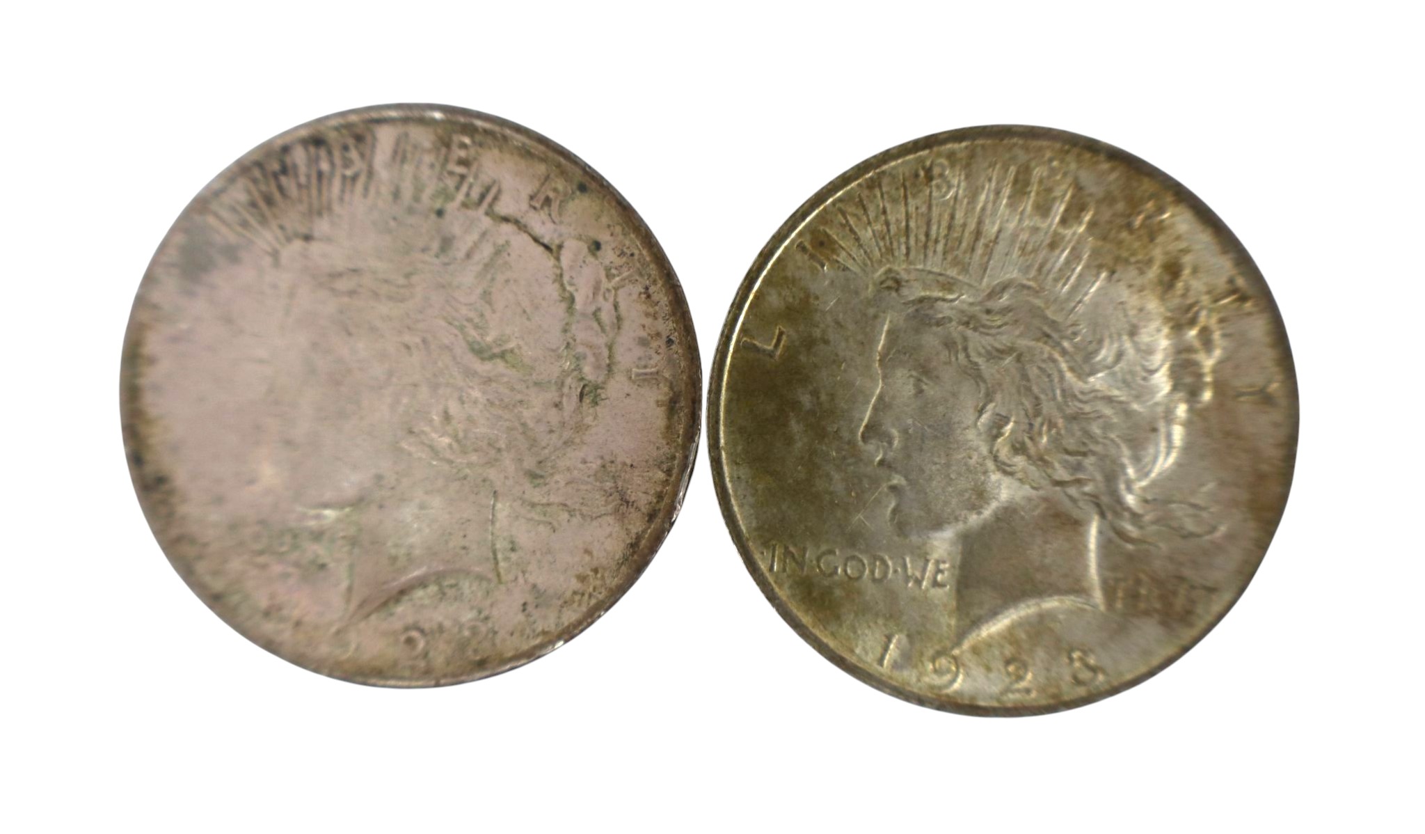 (2) US silver peace dollars $1 dated 1923 & 1923
