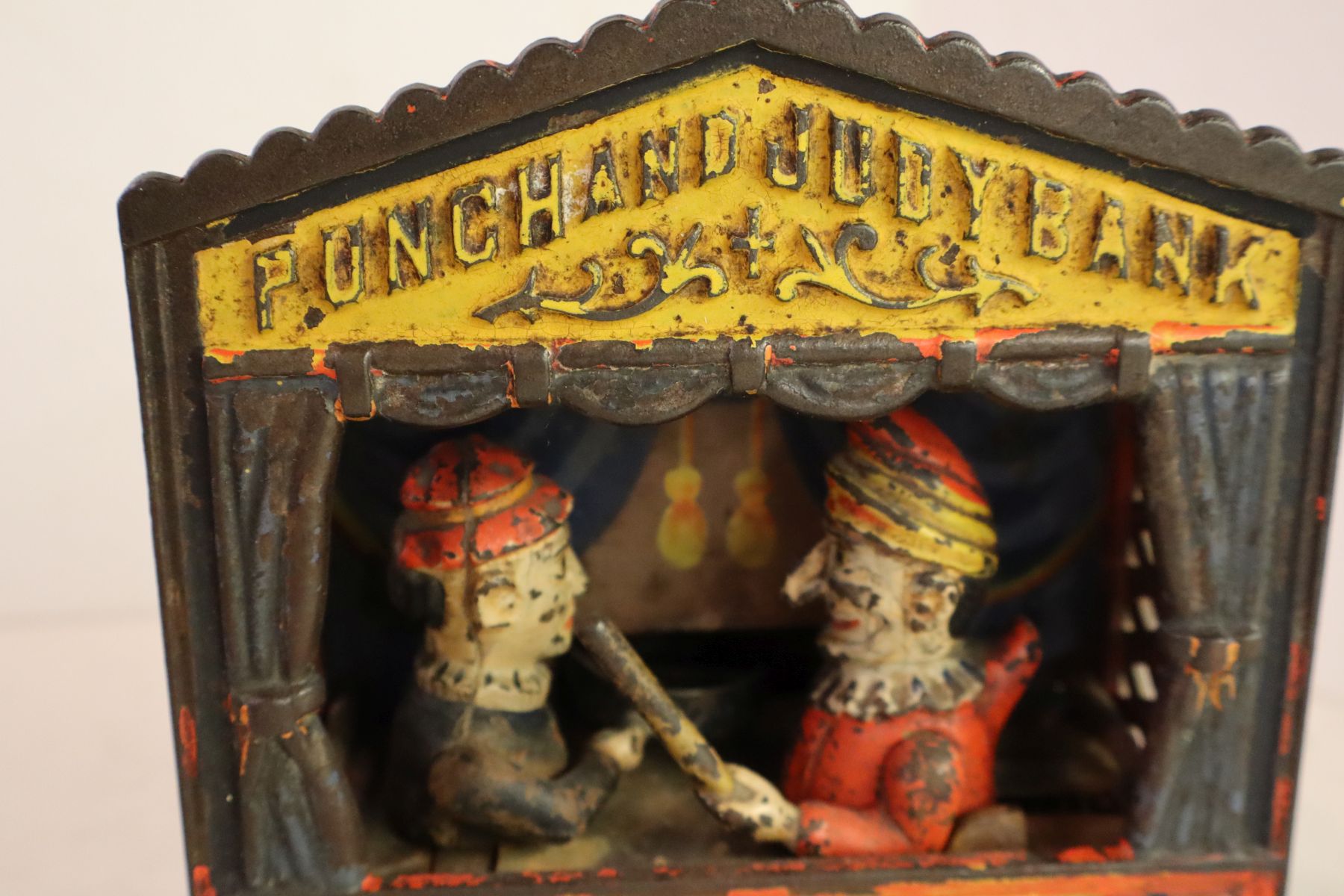 Antique Punch and Judy cast iron mechanical bank