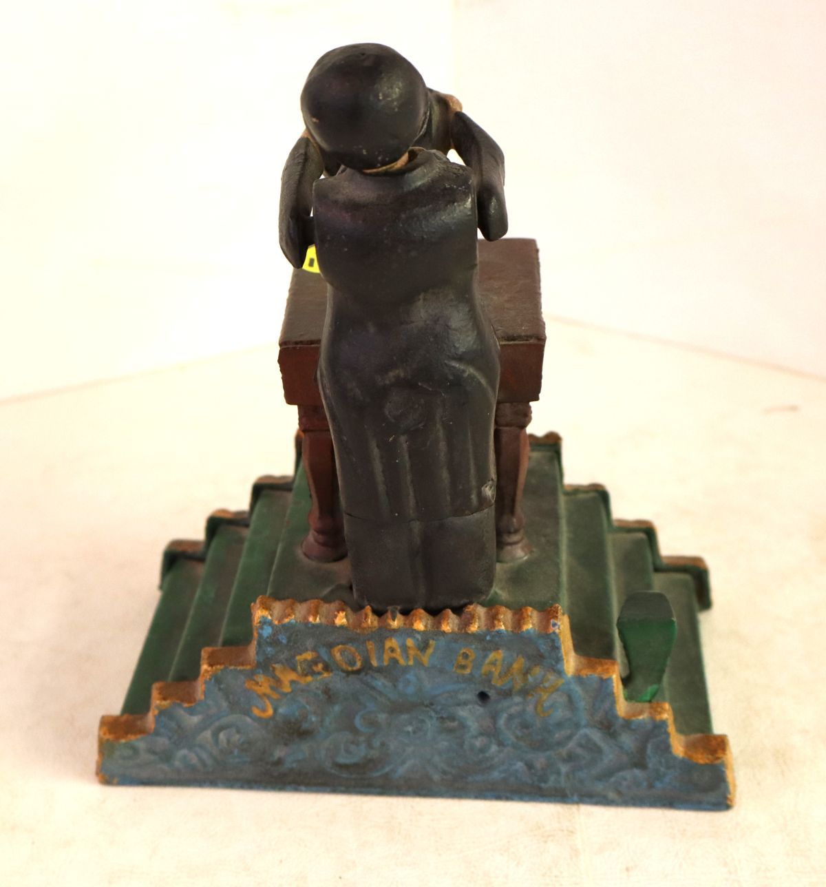 CI Magician mechanical bank in orig paint