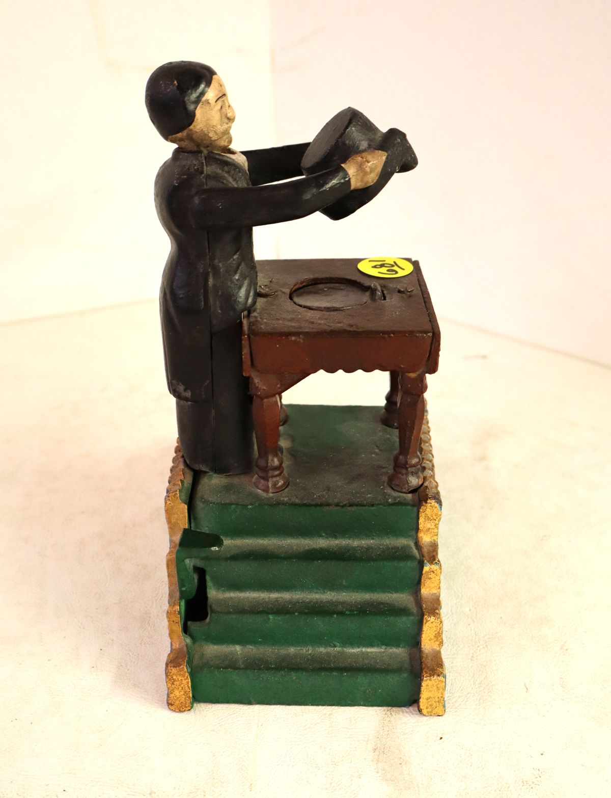 CI Magician mechanical bank in orig paint