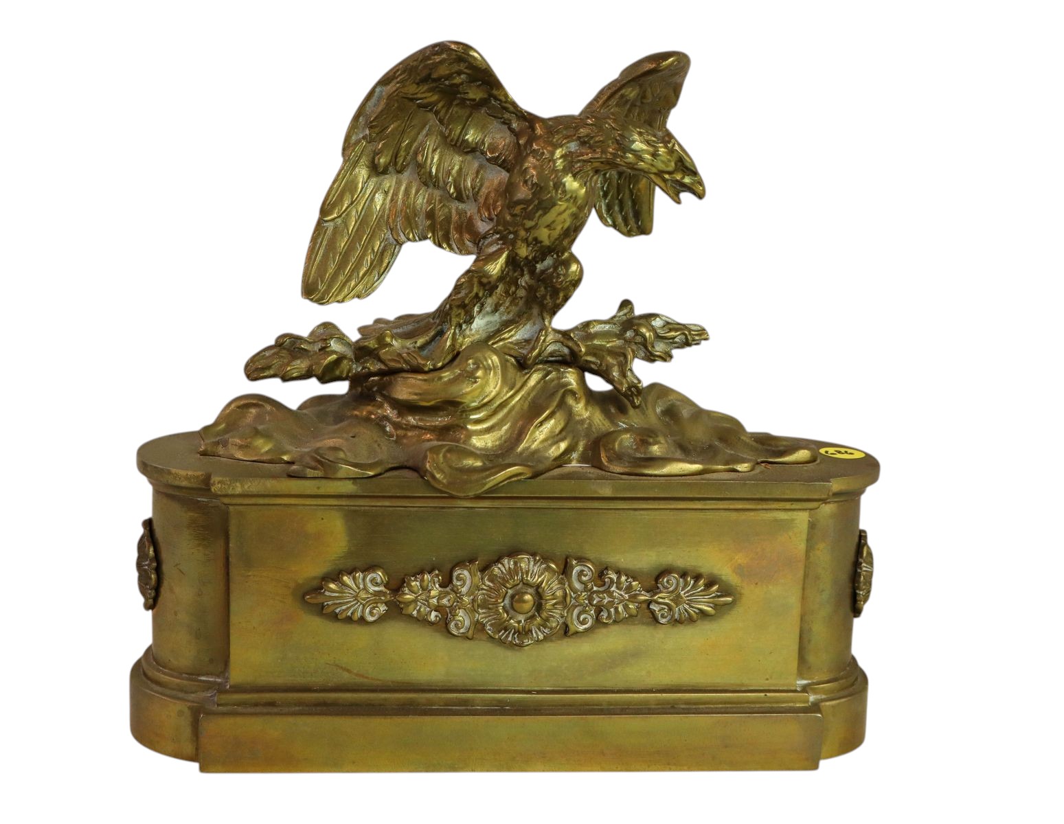Antique brass eagle with patina
