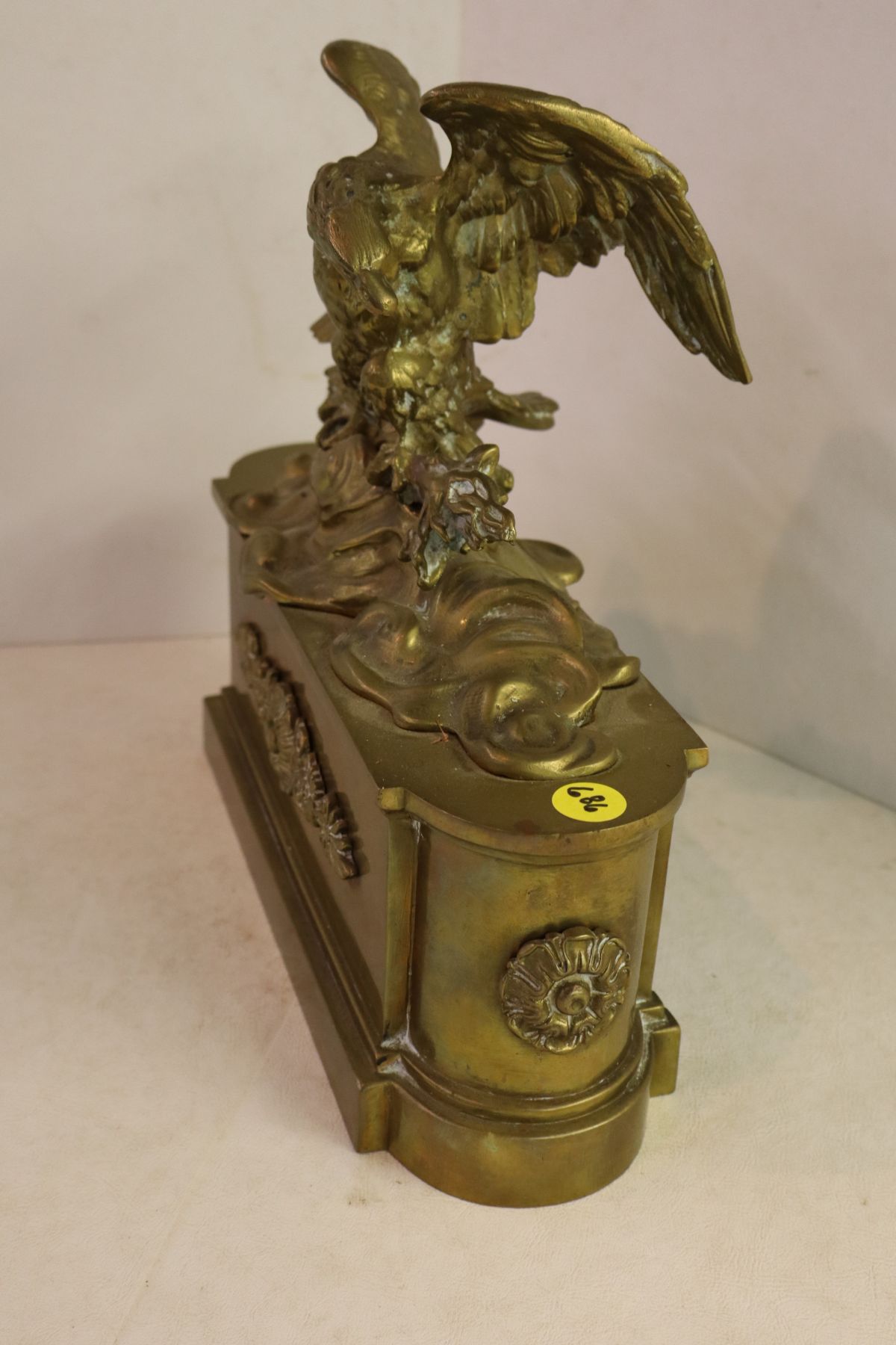 Antique brass eagle with patina