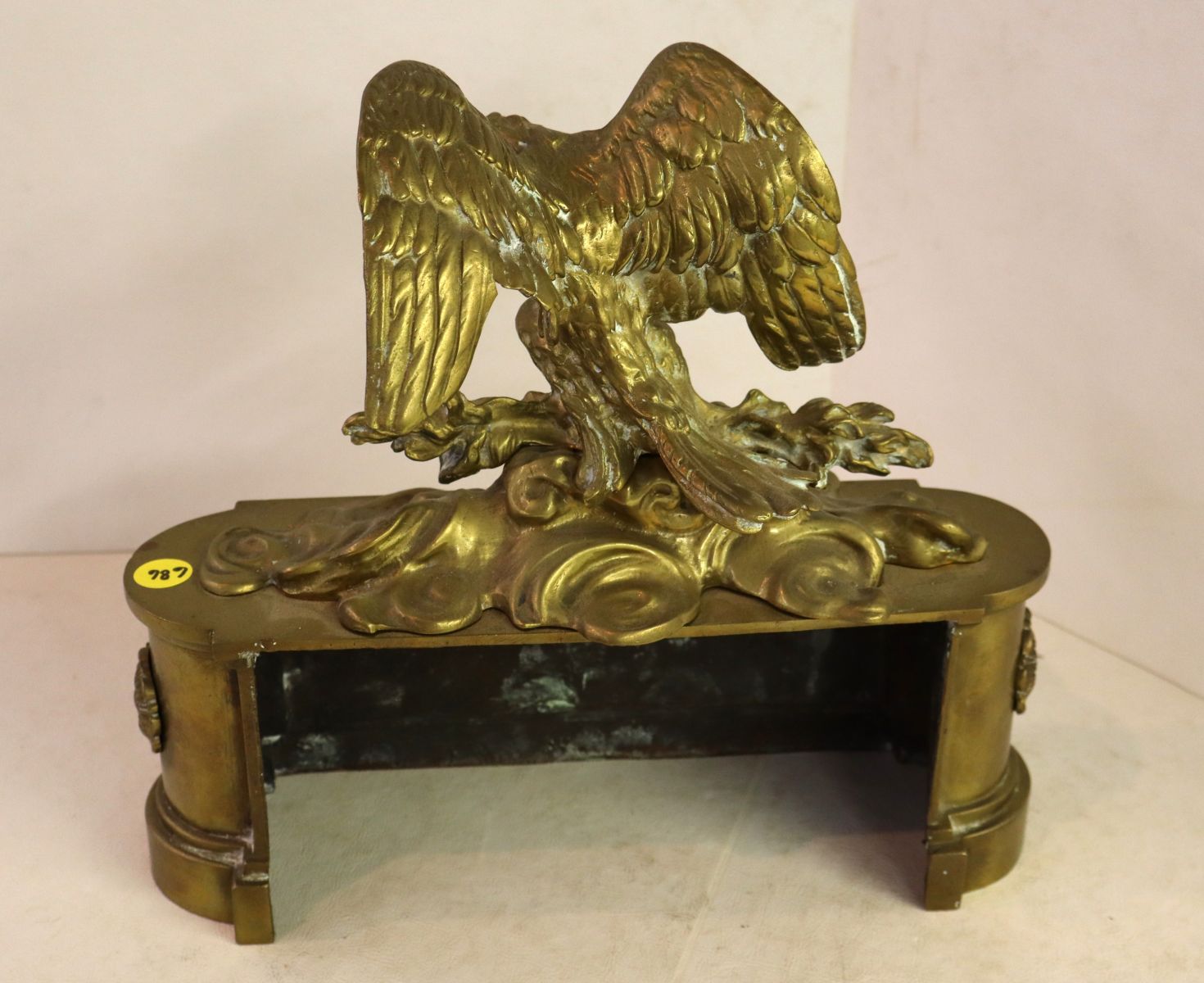 Antique brass eagle with patina