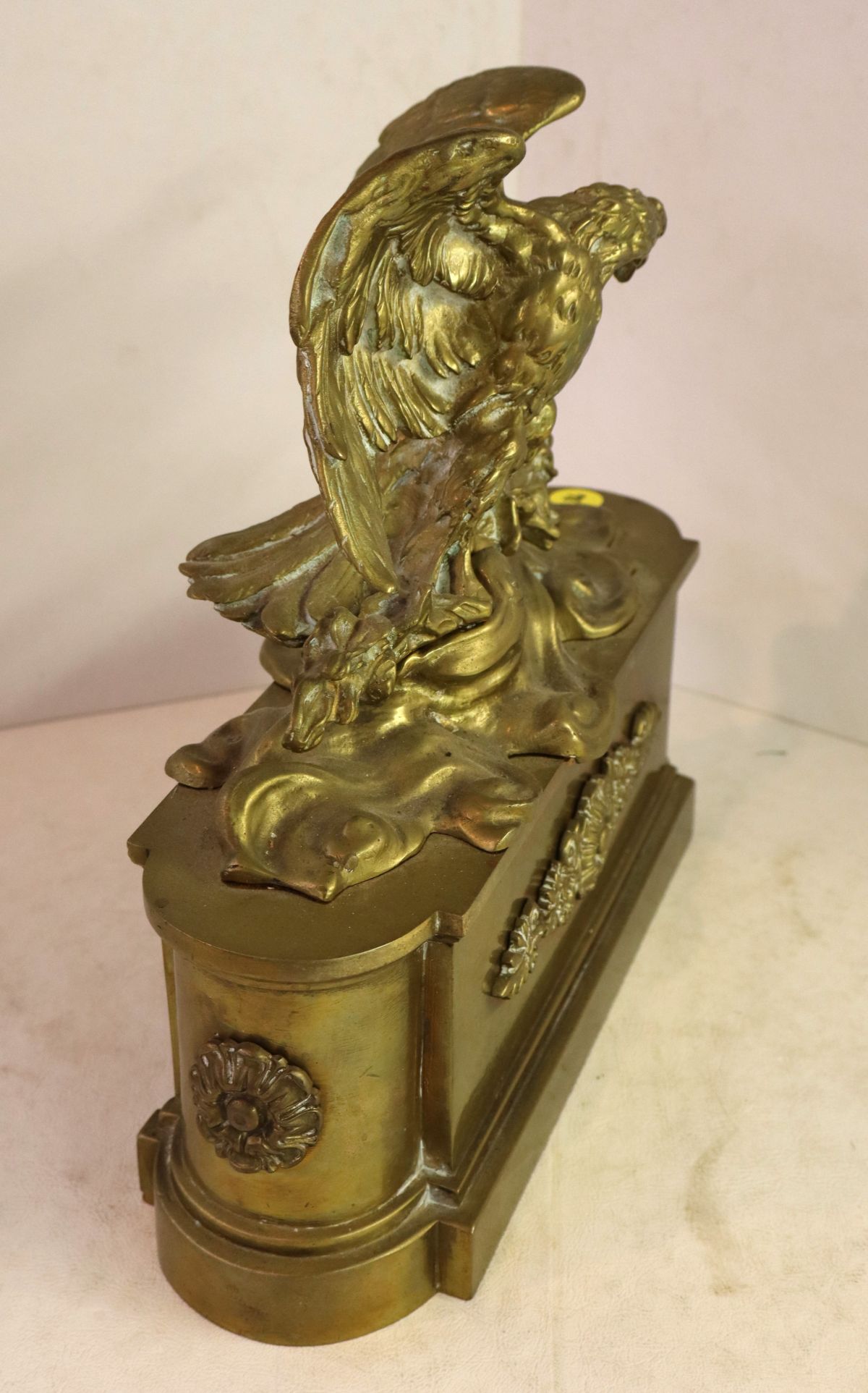 Antique brass eagle with patina