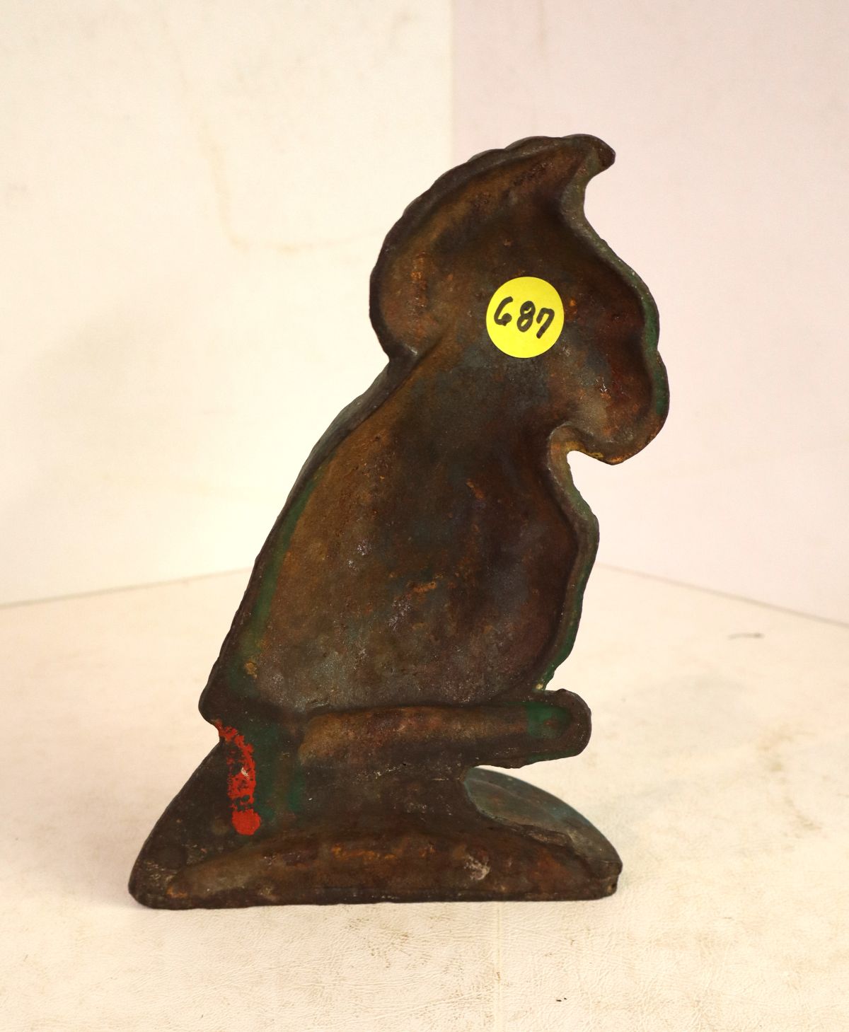 Antique cast iron parrot door stop