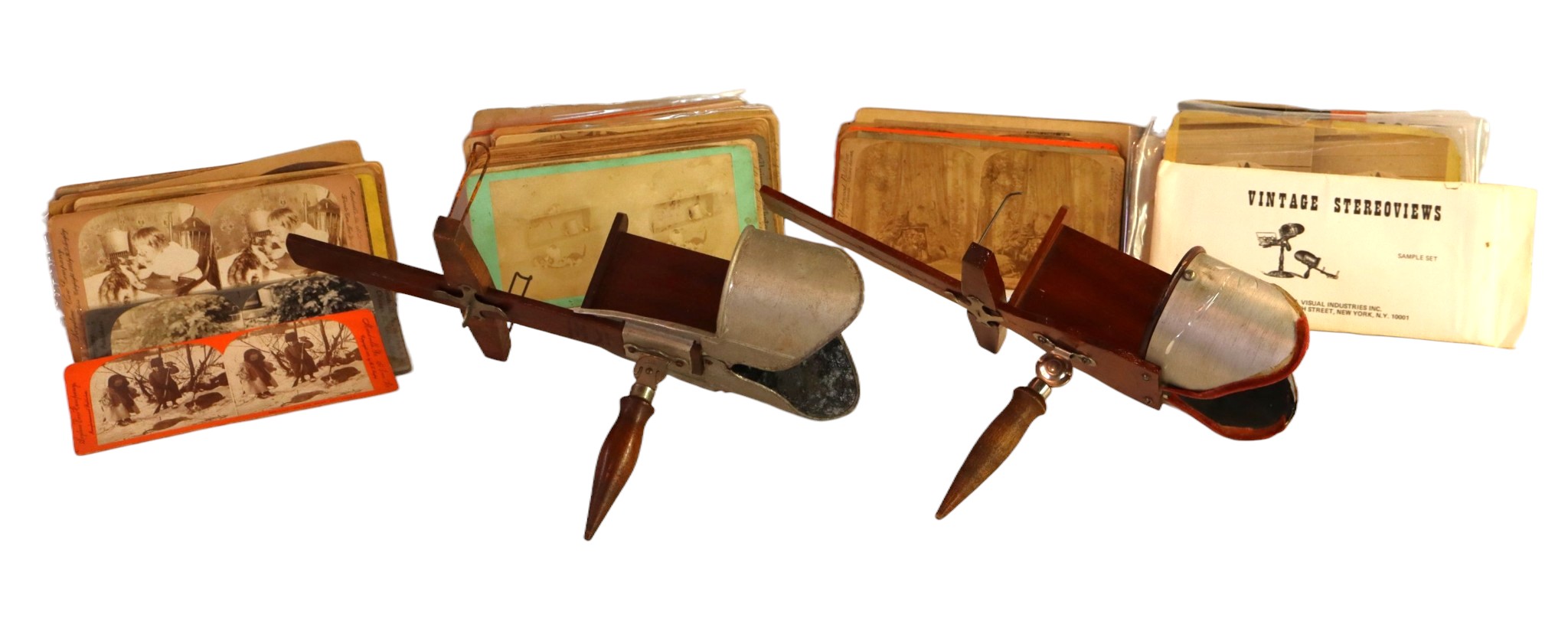 2 vintage stereo viewers with cards