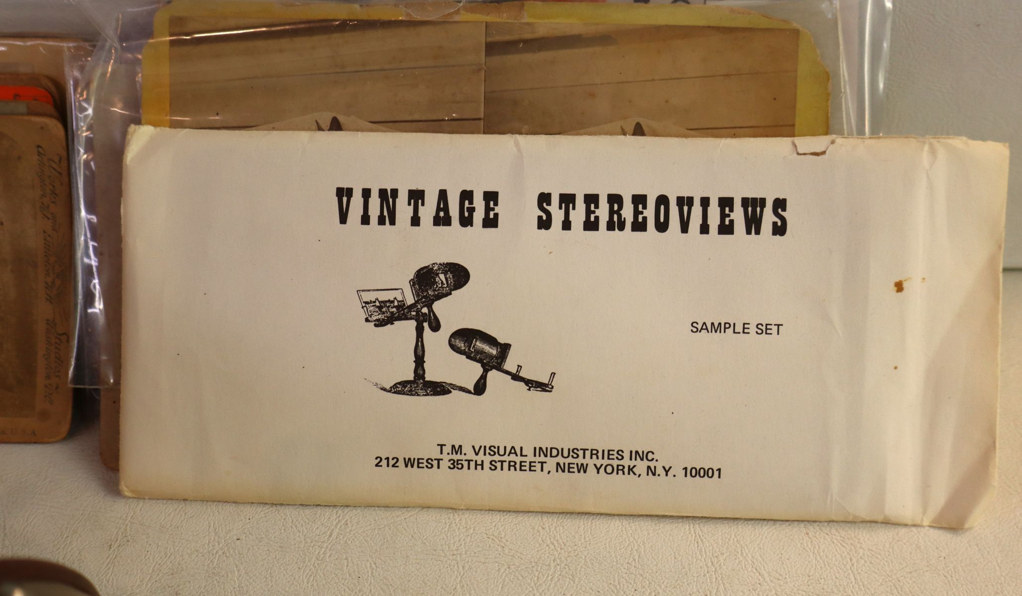 2 vintage stereo viewers with cards