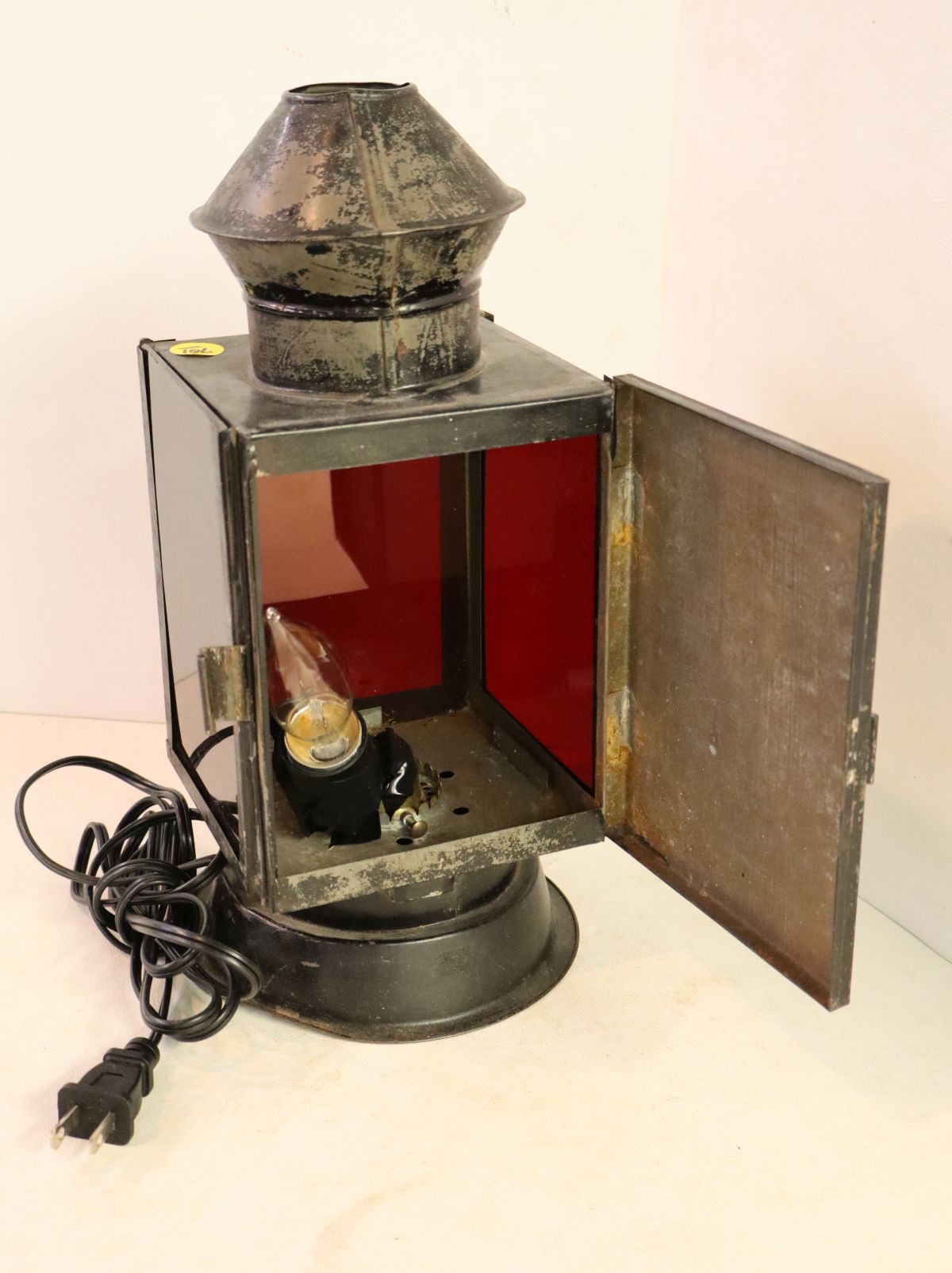 Antique Tin Colonial Finger Lamp has been electrified