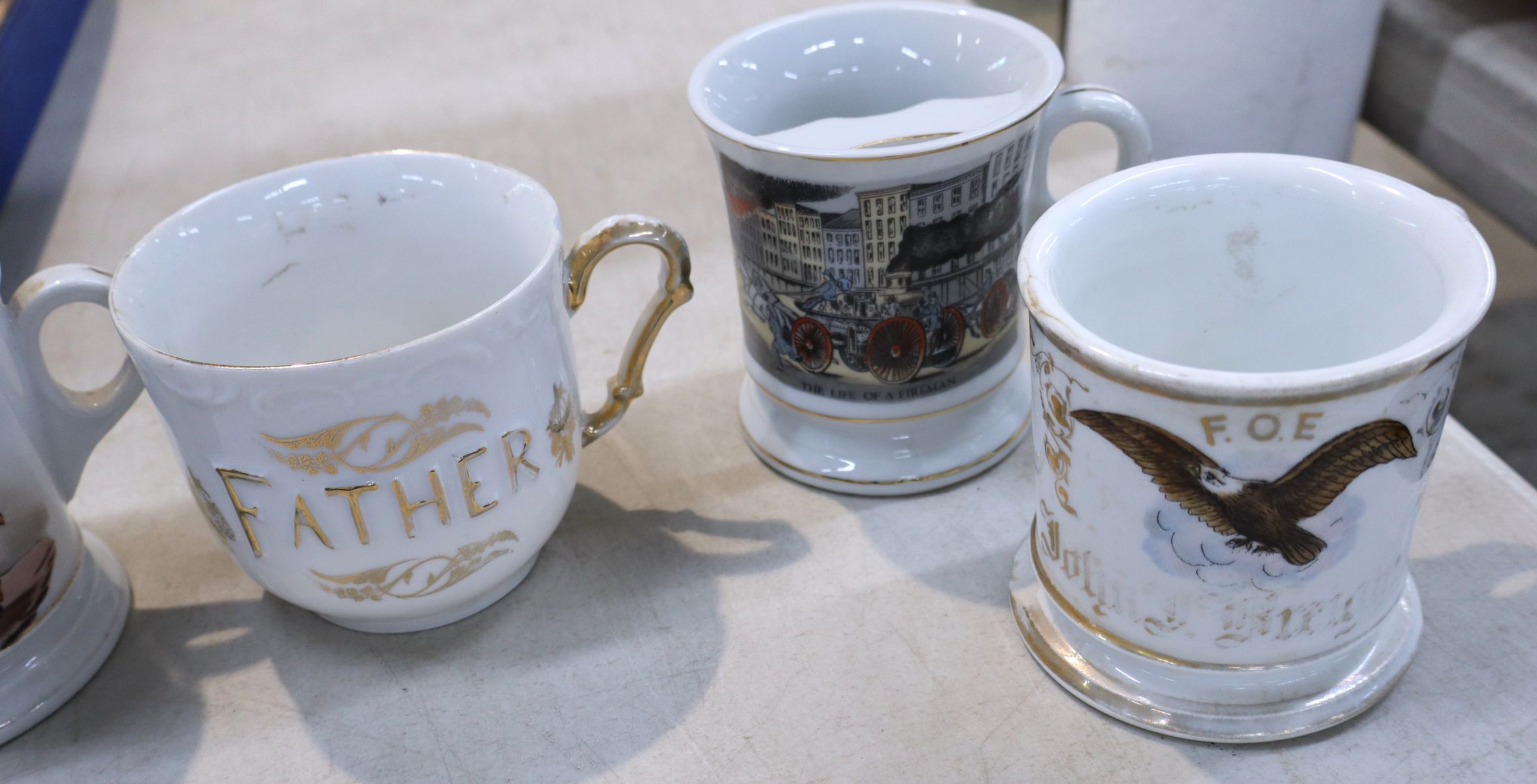 9 antique shaving mugs