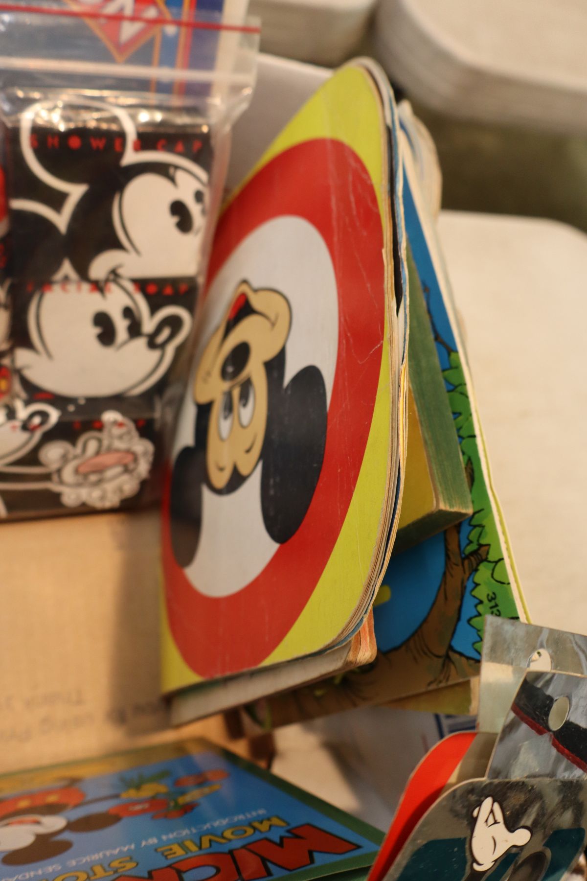 Vintage selection of Mickey Mouse books, toys and other
