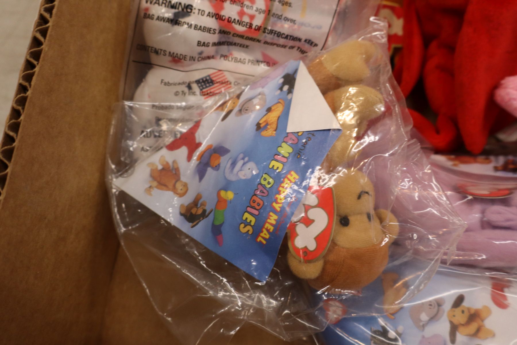 Several vintage TY babies with tags some unopened