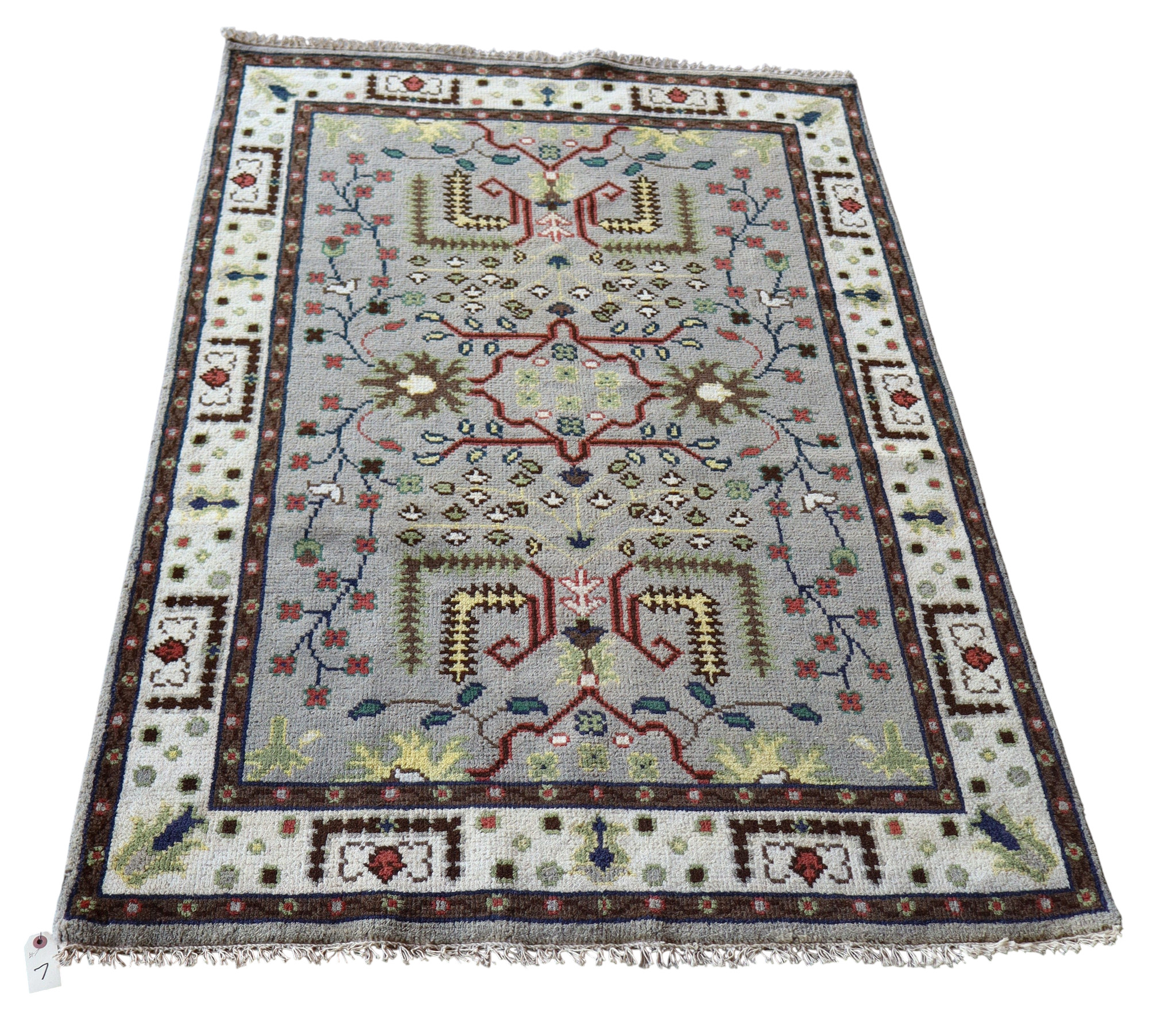 Hand stitched wool rug 72"l x 47"w