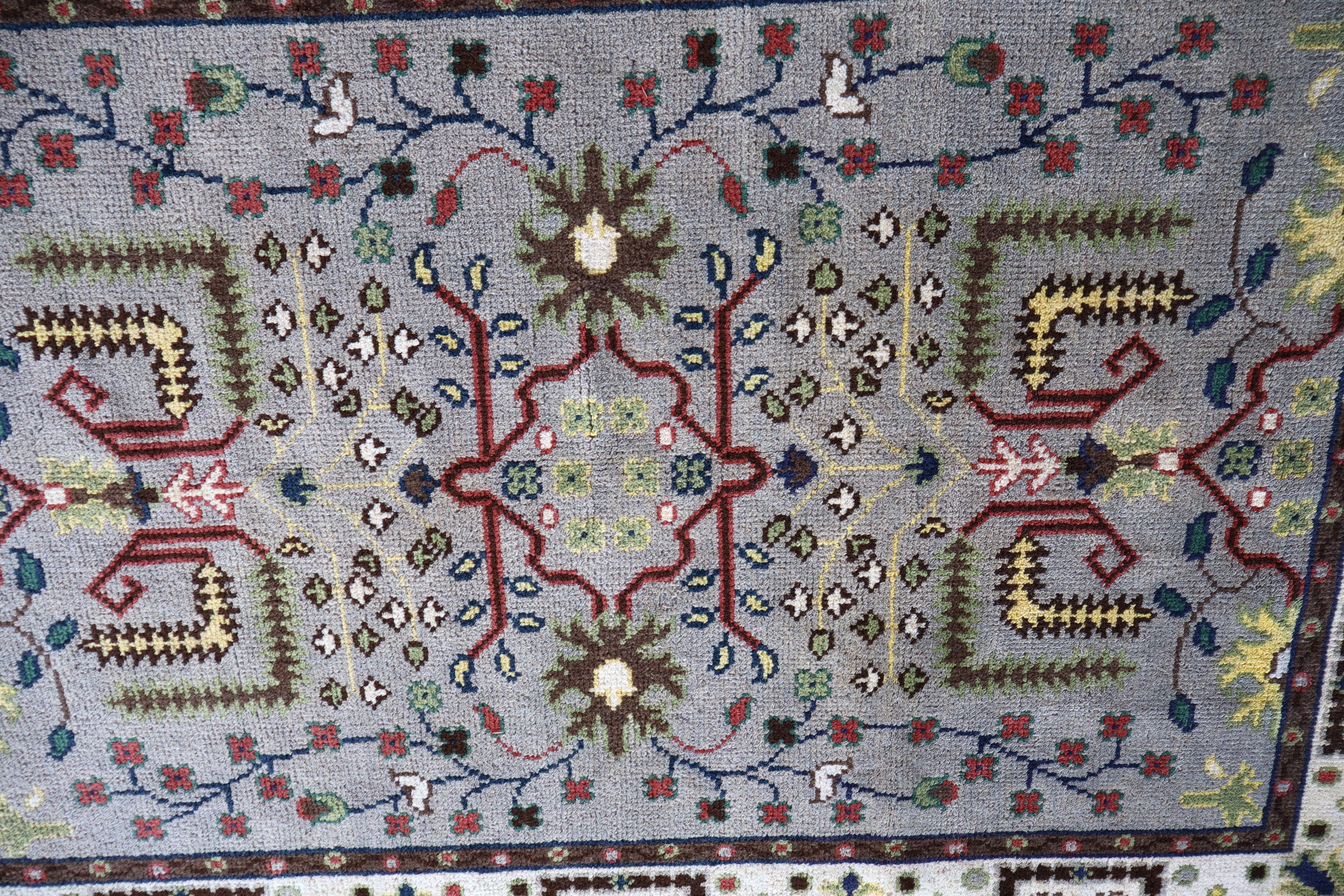 Hand stitched wool rug 72"l x 47"w