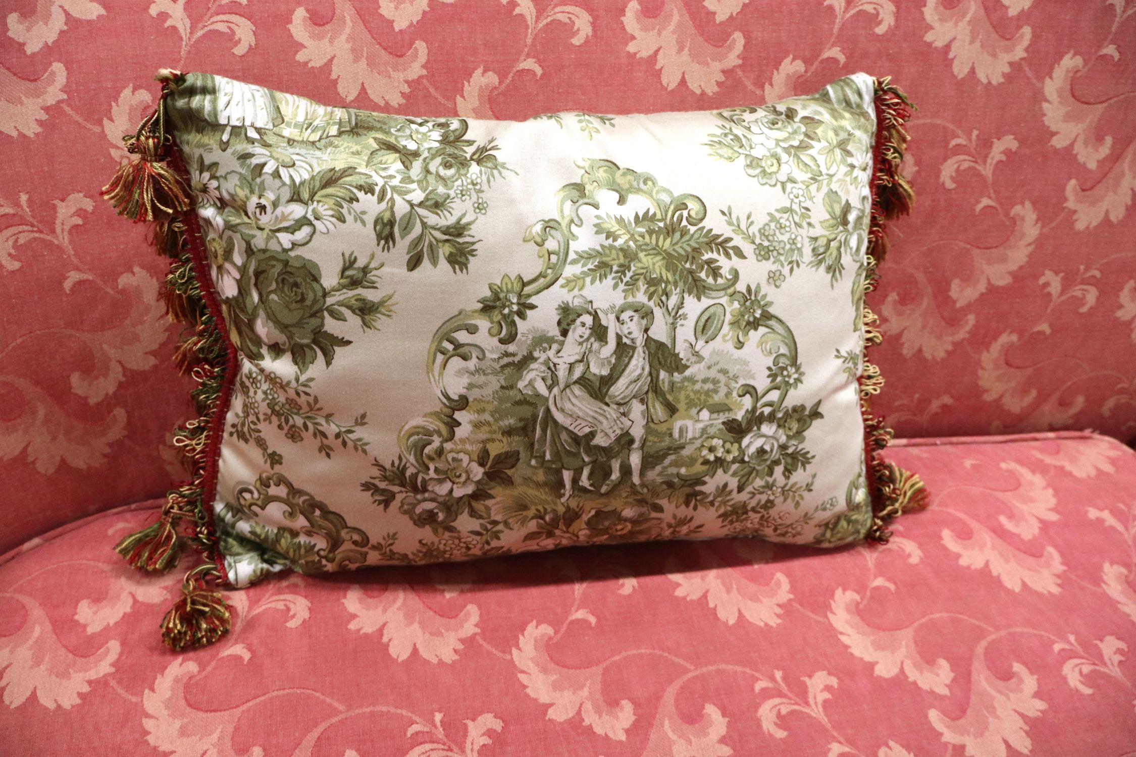 Antique 2 cushion French style mahogany framed sofa with floral upholstery