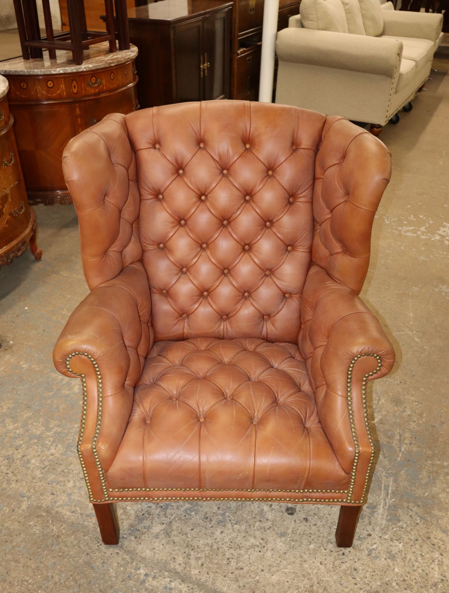 Chippendale Saddle Brown Tufted Leather Wing Chair