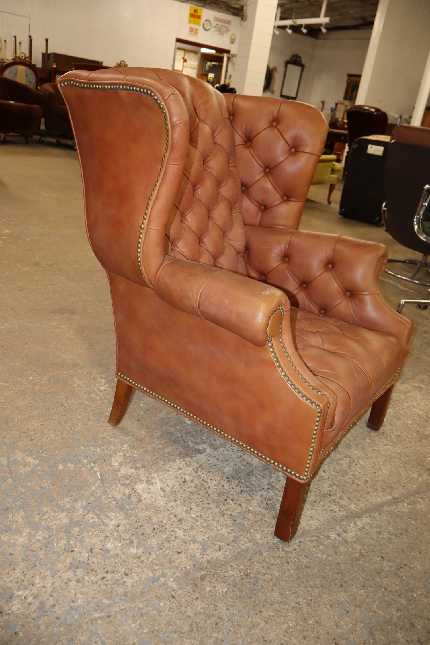 Chippendale Saddle Brown Tufted Leather Wing Chair