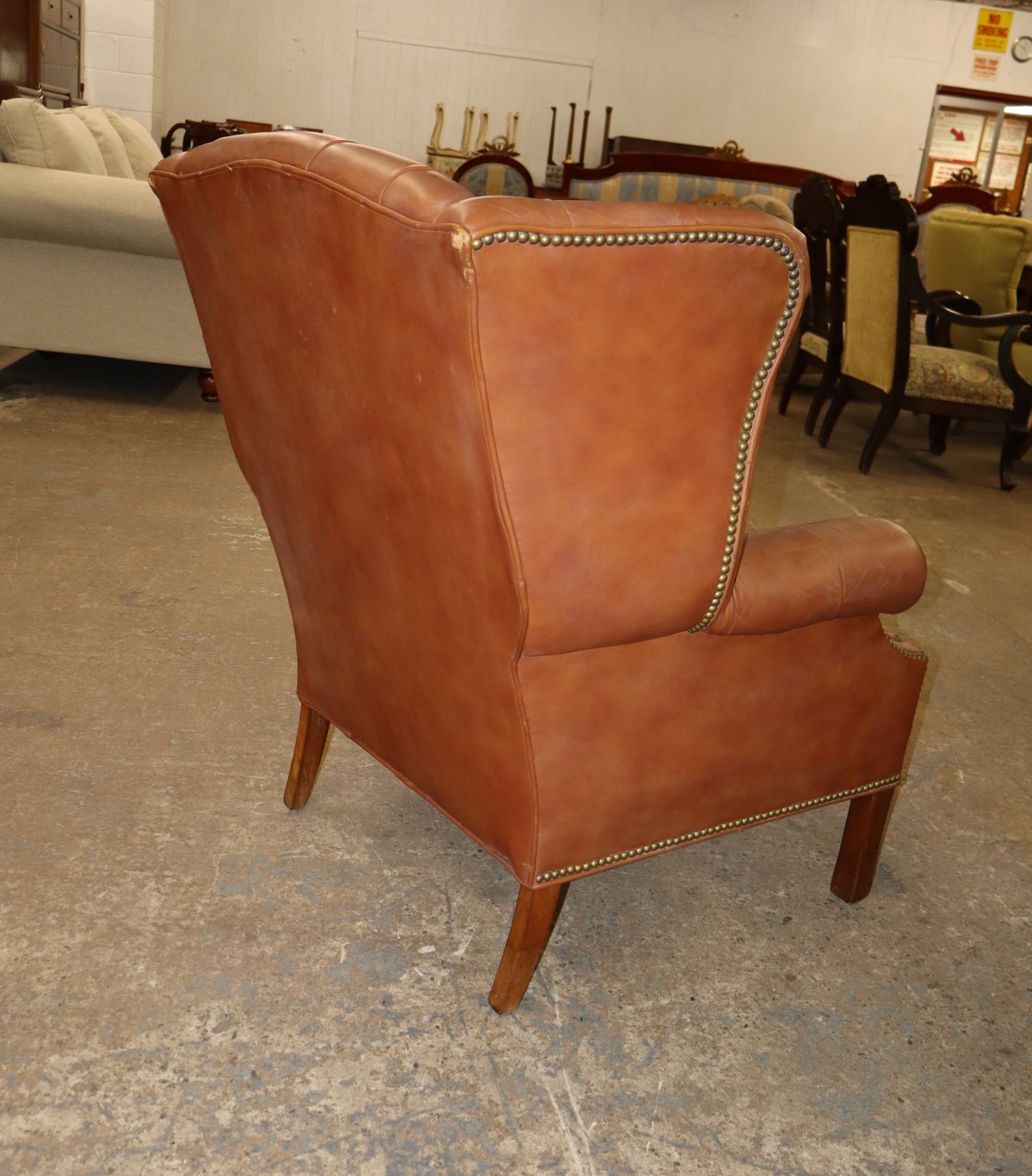 Chippendale Saddle Brown Tufted Leather Wing Chair