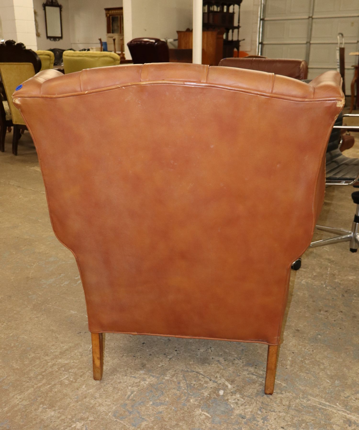 Chippendale Saddle Brown Tufted Leather Wing Chair