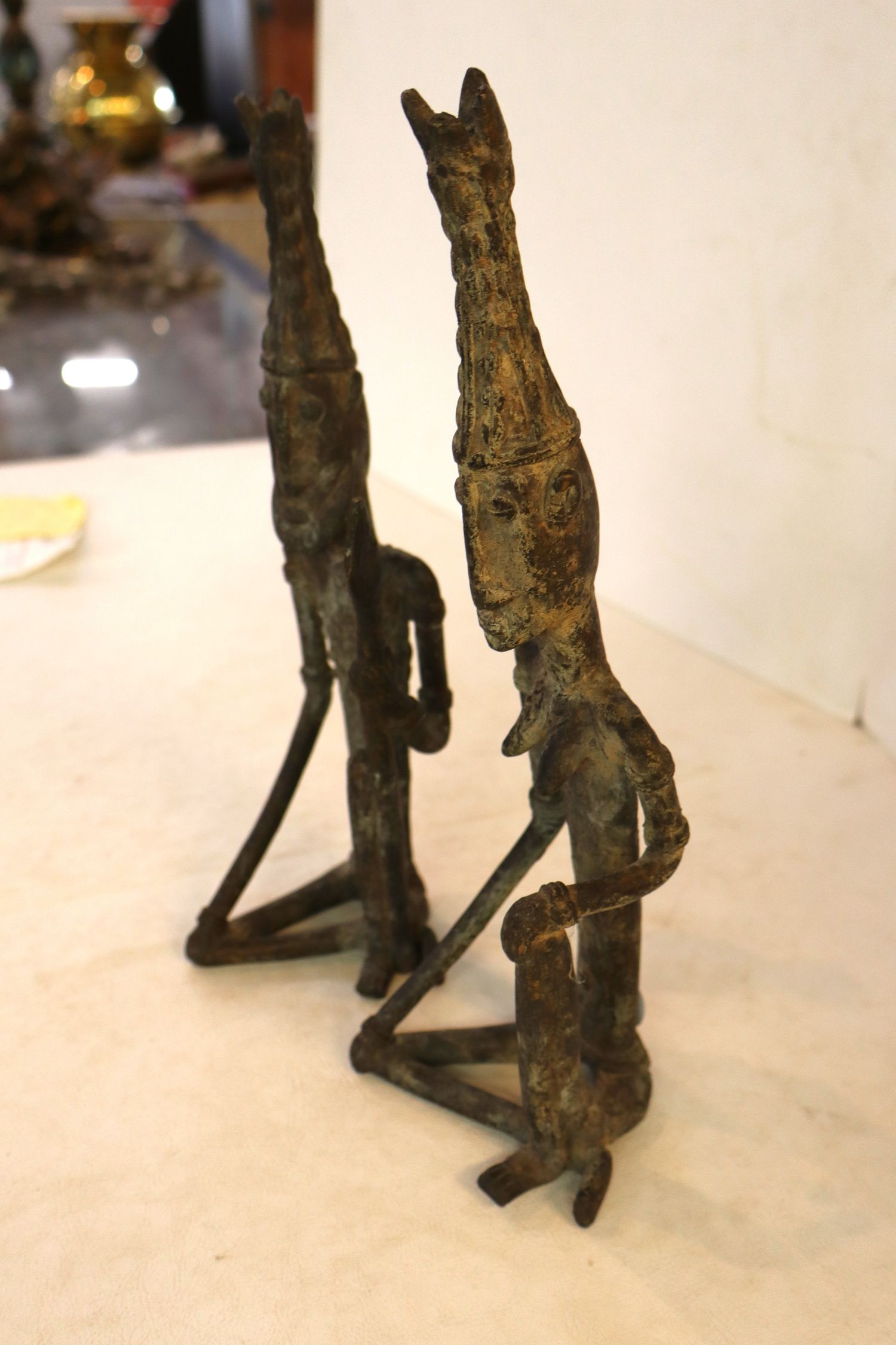 Pair bronze male and female tribal figures