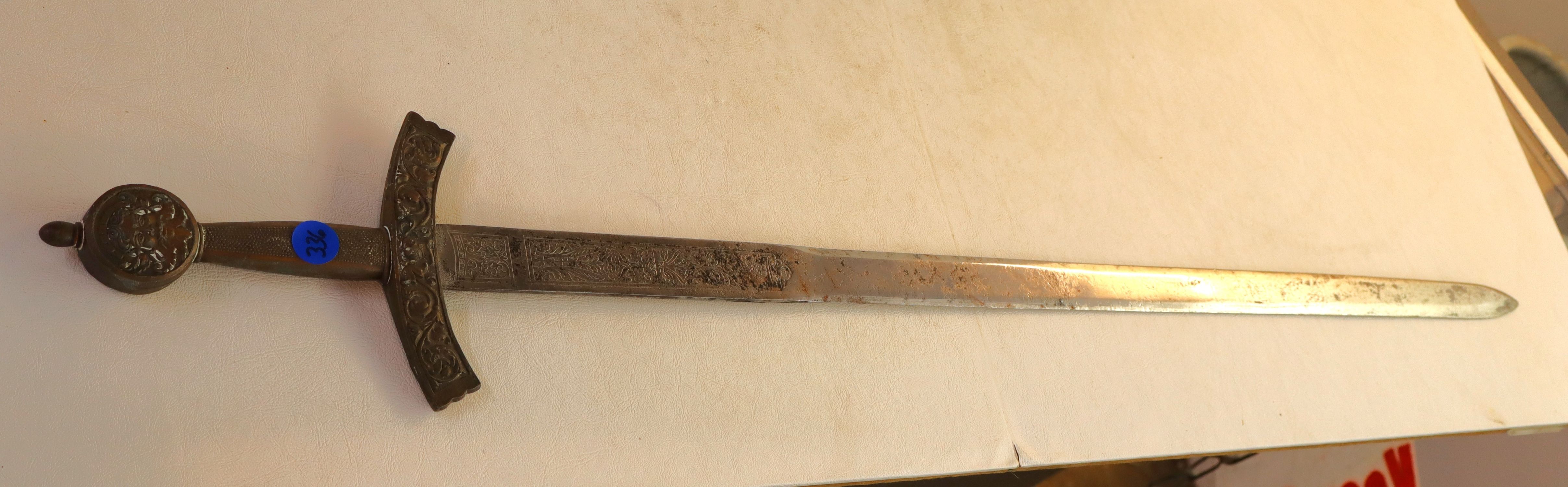 Decorative sword made in Spain. 36"l x 5.5"w