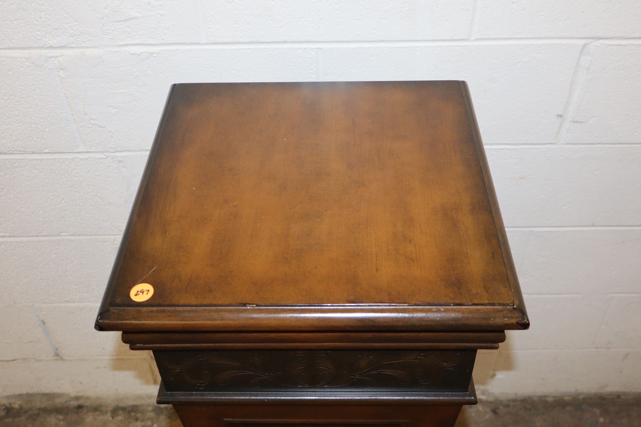 Mahogany pedestal with stamped decoration accents